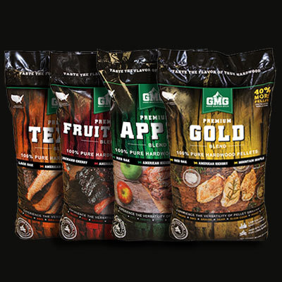 Four bags of Green Mountain Grills premium hardwood pellets, labeled as 'Texas', 'Fruit', 'Apple', and 'Gold', showcasing variety for enhanced grilling flavor.