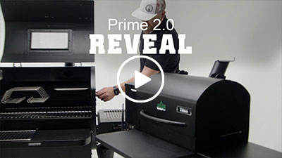 Prime 2.0 wood pellet grill reveal video showcasing features and functionality with a user adjusting the grill.